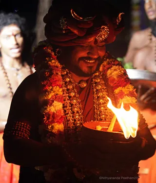 https://nithyananda.org/sites/default/files/photo-gallery/2017-12-Dec-02-nithyananda-diary_bengaluru-aadheenam_barani-deepam-nithyanandeshwara-temple_IMG_9317.jpg?1512289630