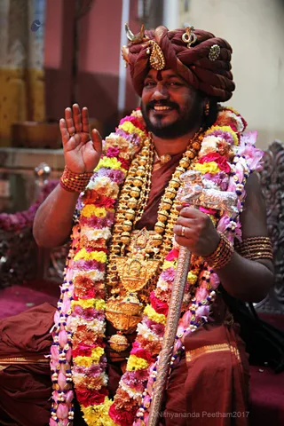 https://nithyananda.org/sites/default/files/photo-gallery/2017-12-Dec-02-nithyananda-diary_bengaluru-aadheenam_barani-deepam-nithyanandeshwara-temple_IMG_9415.jpg?1512289679