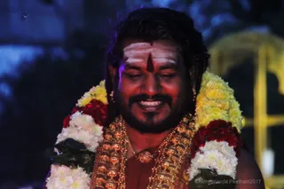 https://nithyananda.org/sites/default/files/photo-gallery/2017-12-Dec-02-nithyananda-diary_bengaluru-aadheenam_karthigai-deepam-lighting_IMG_0471.jpg?1512292700