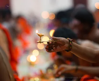 Nithyananda Puja - Aarti is offered