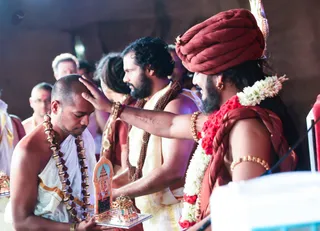 Darshan - His Holiness gifts Mandala to the Inner Awakening participants.