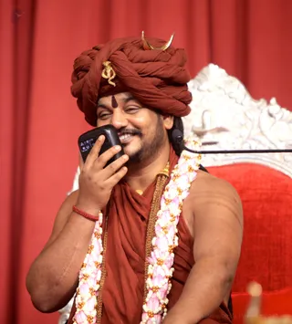 His Holiness takes calls during Dial the Avatar!
