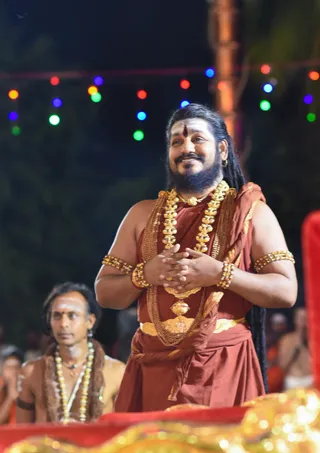 He gazes at the main temple deities: Nithyanandeshwara Sadashiva and Nithyanandeshwari AdiShakti.