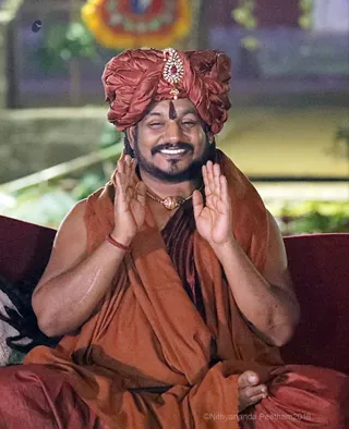 http://nithyananda.org/sites/default/files/photo-gallery/2018-01-Jan-14-nithyananda-diary_tiruvannamalai-aadheenam_kalpataru-darshan_7T7A9858.JPG