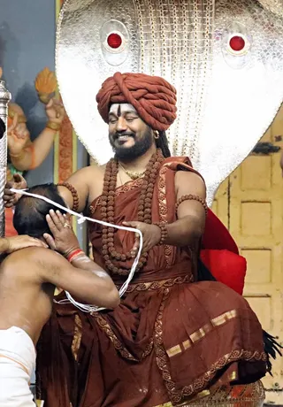 https://nithyananda.org/sites/default/files/photo-gallery/2018-03-Mar-10_nithya-dhyan-yoga-shiva-deeksha_7T7A5668.jpg?1569047699