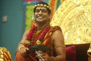 http://nithyananda.org/sites/default/files/photo-gallery/24_Nithyananda_dial-the-avatar_04may2012.JPG