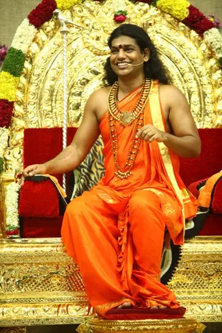 http://nithyananda.org/sites/default/files/photo-gallery/33_Nithyananda_14th_Apr_2012.JPG