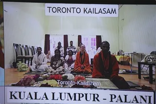 Devotees attending satsang through 2-way video Conferencing.