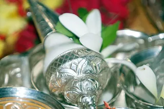 Arghya - the traditional bouquet offered to the Master.