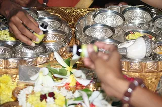 Gandha tailam, scented oil, offered to the Healer of all the worlds.