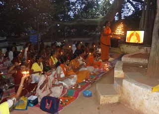 Arathi Being Offered During Padapuja