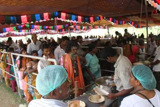 People standing in queue for food