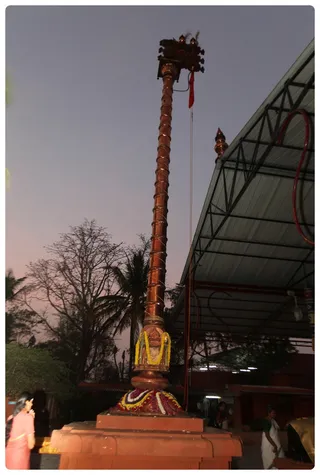 Dwajastabam - awaits the start of MahaShivaratri along with the rest - devotees, disciples, ashramites.