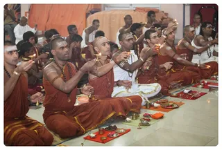 Offering Arathi During Padapuja