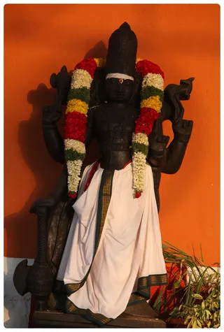Dwarabalaka in the entrance of Nithyanandeswara Temple