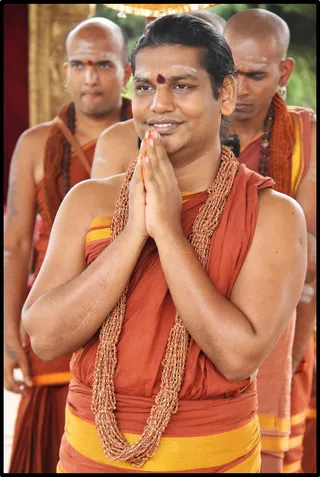 Swamiji having darshan of Nithyanandeswara and Nithyanandeswari.