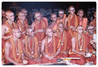 The fortunate ones who took Sanyas initiation on the auspicious day at the Viraja Homa listening to Swamiji.