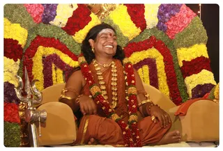 Swamiji greets all devotees, those who are there physically and virtually.