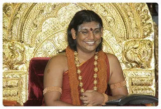 http://nithyananda.org/sites/default/files/photo-gallery/Nithyananda_Swami_23031317.JPG