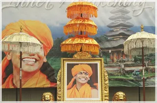 Tradiation Balinese Umbrellas decorate Swamiji's Ananda Gandha Photo