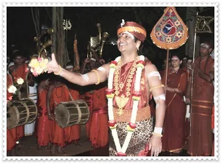 offering flowers to sacred banyan tree