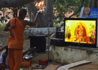 Arathi During Pada Puja