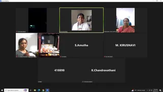 A screenshot of a Zoom meeting window with a grid of video tiles. Top centre, a smiling woman in white clothing with a rudraksha-style necklace stands before a framed picture, labelled Premabhaktika. Top right, a woman in a red sari with a bindi sits in a room with shelves, labelled Subhashini, ooty,Tamilnadu. Middle left, a woman with glasses sits with hands folded in namaskar before a small home altar with lit lamps and offerings, labelled C A Shakunthaladevi Dayajingam. Other tiles show only name labels or numbers on dark backgrounds, including S.Amutha, M. KIRUSNAVI, 418898 and K.Chandravathani. The taskbar shows a 2024-05-10 timestamp and a 14°C weather widget.