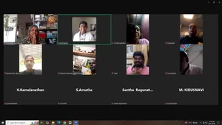 A screenshot of a Zoom video call gallery viewed on a Windows desktop, showing eight participant tiles in a grid. Tiles show a woman with hands pressed in greeting in a home with shelves, a woman in a white top and red-bordered garment highlighted with a green frame, an older woman in a pink top, a man in dark clothes beside bookshelves, a man with glasses in a room with blinds, a man in a saffron-toned shirt beside shelves of figurines, a man with a beard gesturing in front of a framed picture, and a man in a white shirt. Name labels show Arunthathy Karunakaran, Premabhaktika, K.Chandravathani, Jeyaseelan, Paramasivam Karur, Kailasa Muniasamy Tiruchendur, Vinay, S.viswanthan, K.Kamalanathan, S.Amutha, Santha Ragunathan and M. KIRUSNAVI. The taskbar clock reads 11:32 AM, 2024-09-08.